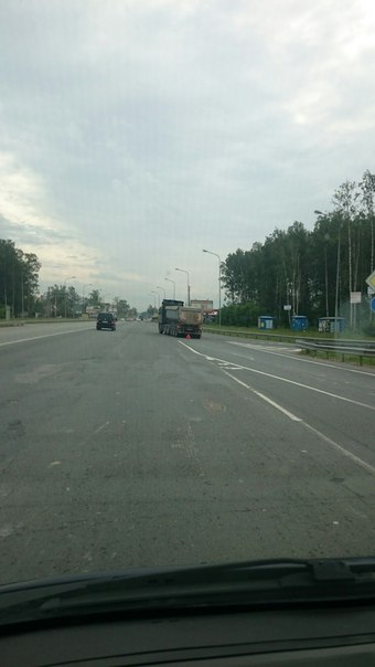 Съезд с кольца на Колтушское шоссе. Справа гетц подлез (на ходу было не сфоткать, поэтому его не вид...